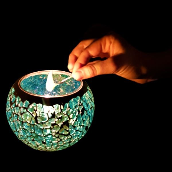 Lighting your PureAz River of Dreams mosaic candle