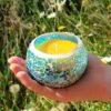 River of Dreams mosaic candle in hand to show relative size