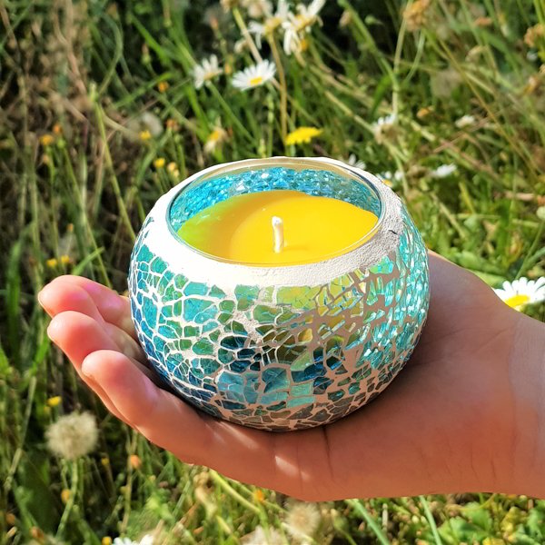 River of Dreams mosaic candle in hand to show relative size
